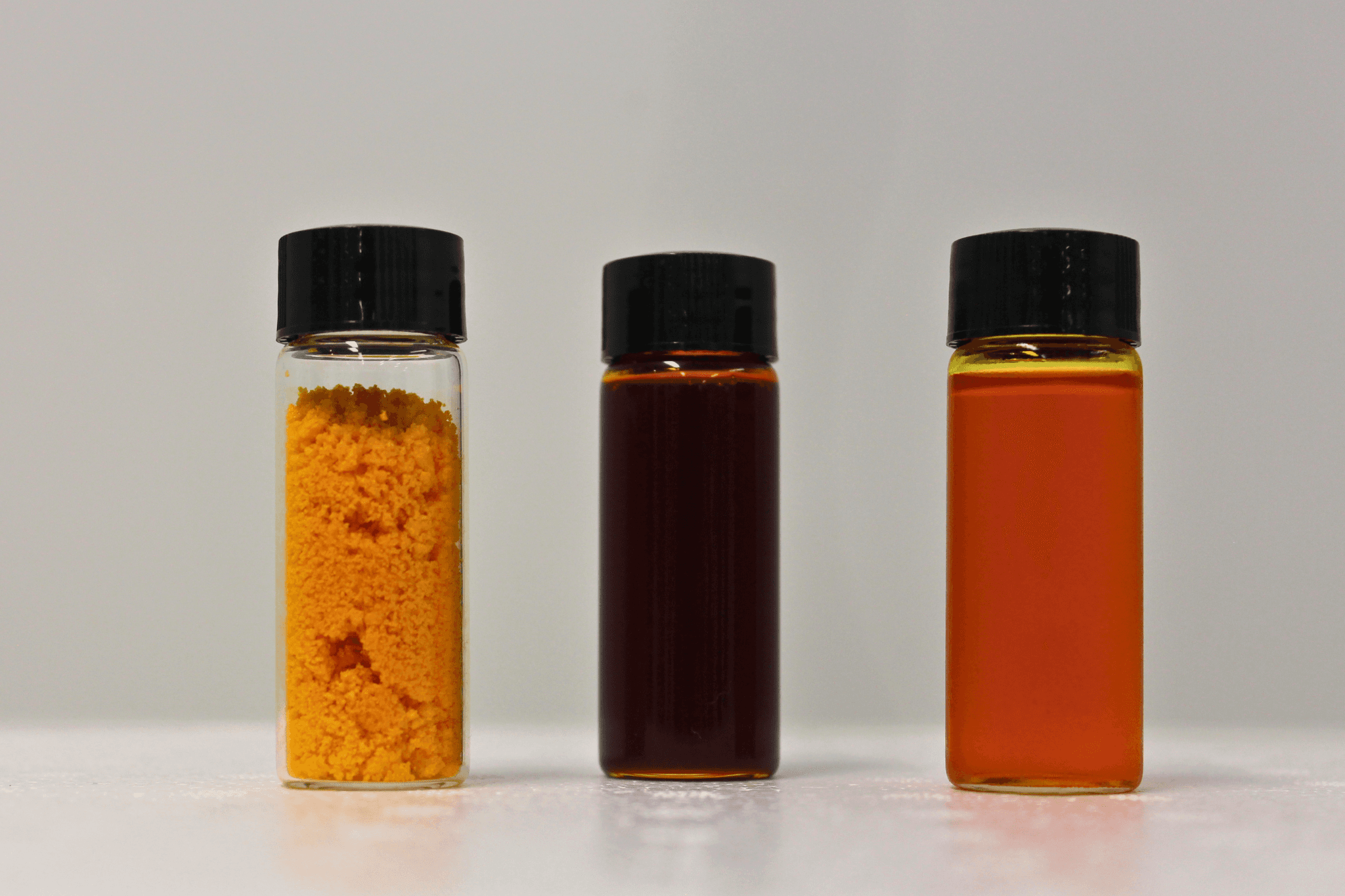 Three sample vials showing powder, concentrated paste and liquid ingredient formats